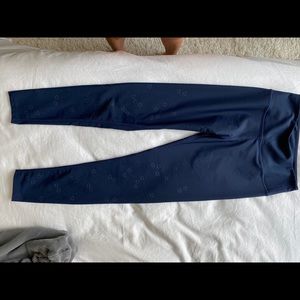 Navy Soulcycle leggings with grey stars. Size S